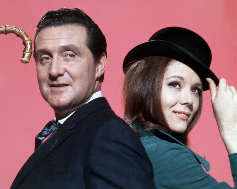 British actors Patrick McNee and Diana Rigg are John Steed and Emma Peel, on the set of the TV Series The Avengers, created by Sydney Newman. (Photo by ABC Weekend Television/Associated British Corporation/Sunset Boulevard/Corbis via Getty Images)