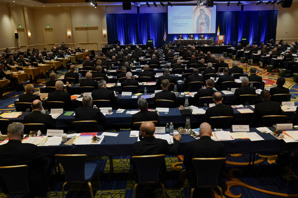 Clergy attend the Fall General Assembly meeting of the United States Conference of Catholic Bishops, Wednesday, Nov. 17, 2021, in Baltimore.(AP Photo/Julio Cortez)