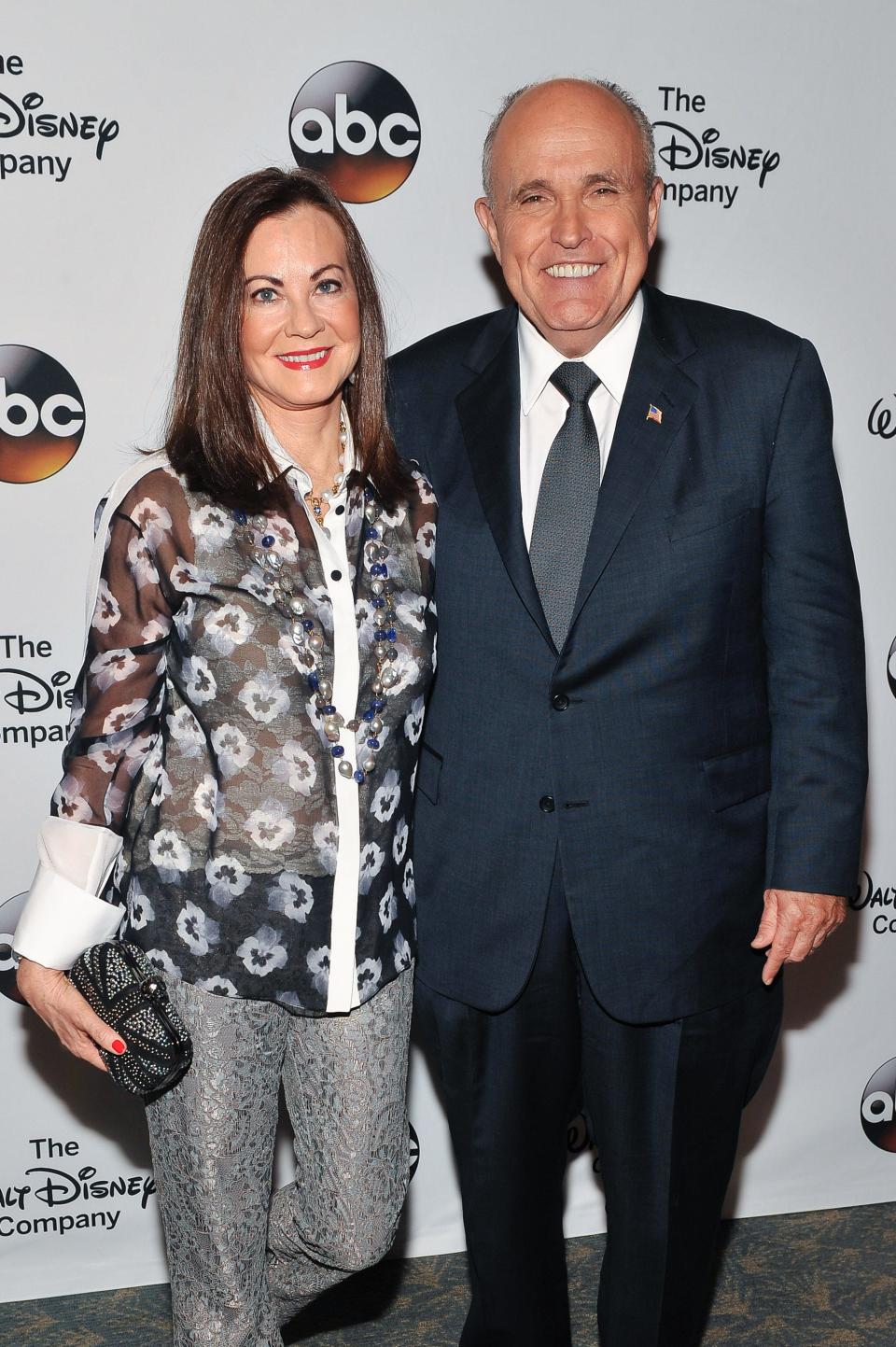 This file photo, taken in May 2014, shows former New York City mayor Rudolph Giuliani and his then-wife, Judith Nathan, as the couple attended the Celebration of Barbara Walters Cocktail Reception Red Carpet at the Four Seasons Restaurant in Manhattan.  (Photo by D Dipasupil/Getty Images)