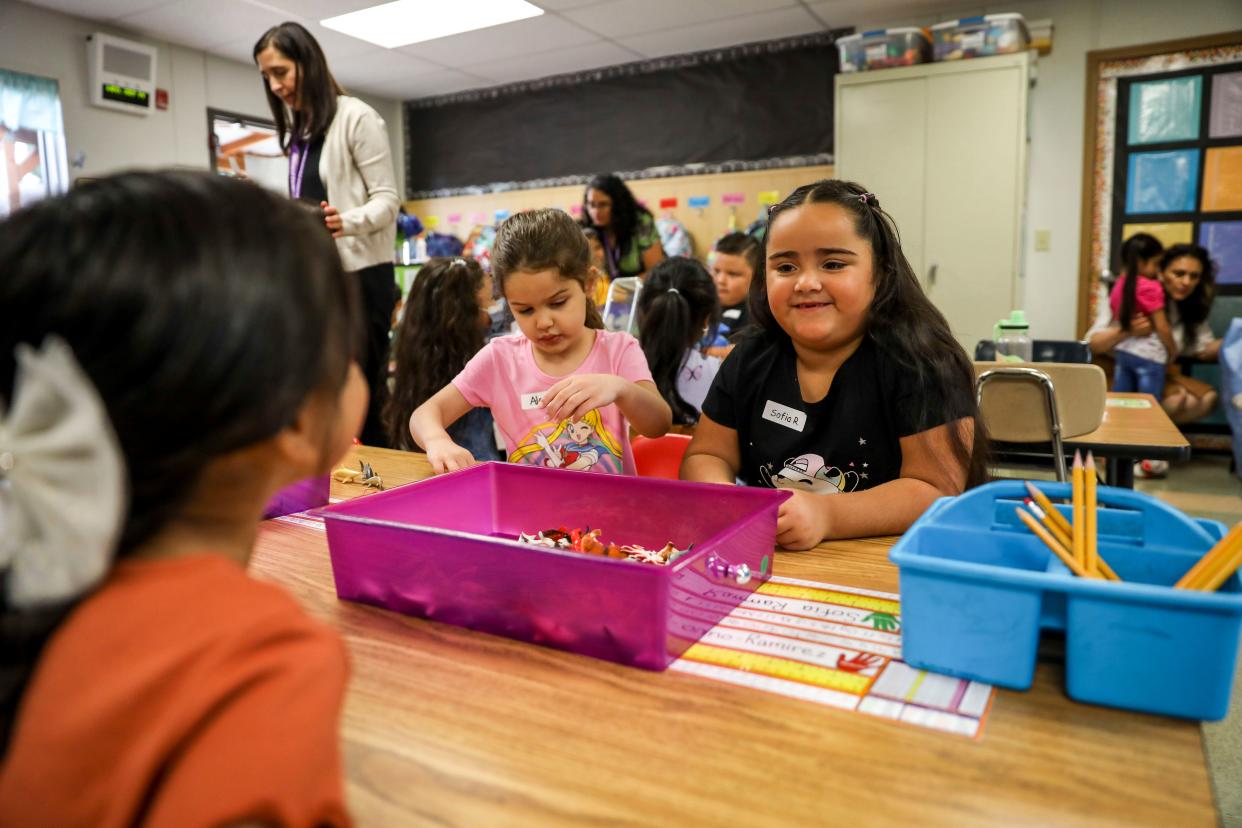 Sofia Ramirez Torres plays with her classmates on the first day of kindergarten Sept. 14 at Hammond Elementary School.