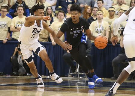 Jan 22, 2019; Pittsburgh, PA, USA; Duke Blue Devils forward Cam Reddish (2) dribbles the ball against Pittsburgh Panthers guard Au'Diese Toney (5) during the second half at the Petersen Events Center. Duke won 79-64. Mandatory Credit: Charles LeClaire-USA TODAY Sports