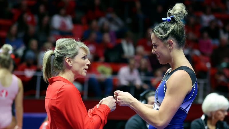 Associate head gymnastics coach Carly Dockendorf fist-bumps Jaylene Gilstrap after Gilstrap’s beam routine during the University of Utah Red Rocks gymnastics preview at the Huntsman Center in Salt Lake City on Dec. 9, 2022. Dockendorf is the new head coach.