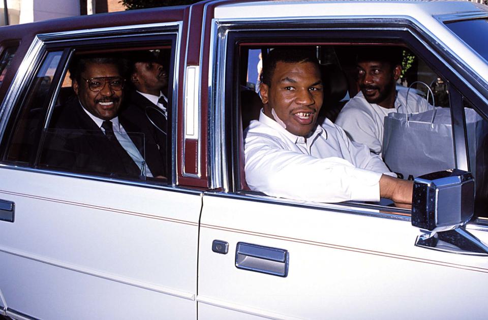 Lowriders! And no-one was lower that Don King, who somehow managed to give the fight game an even worse name, in the back. Mike in the front seat, when he was a money machine for King and everyone was all smiles (Photo by Jeff Kravitz/FilmMagic, Inc)