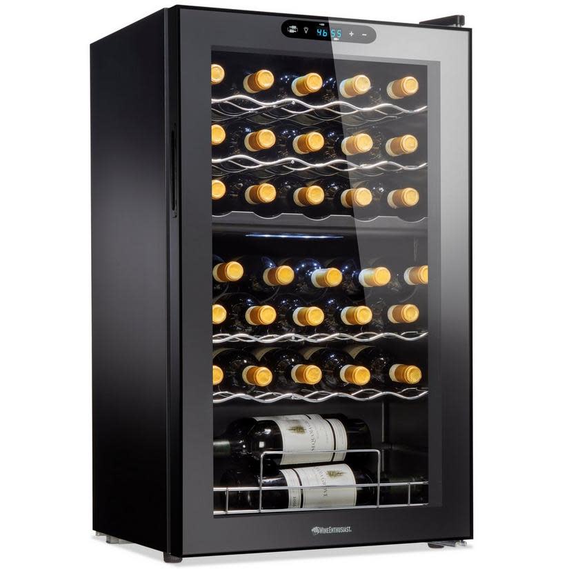 <p><a href="https://www.wineenthusiast.com/w/wine-enthusiast-32-bottle-dual-zone-max-compressor-wine-cooler?AID=11555543&PID=7923151&SID=6402147%7Cnf17db3720135424eb6aa68214479cb1317%7C%7C1689270542256%7C&cjevent=8dee548621a511ee801d6b500a1cb827" rel="nofollow noopener" target="_blank" data-ylk="slk:Shop Now;elm:context_link;itc:0;sec:content-canvas" class="link ">Shop Now</a></p><p>32-Bottle Dual Zone MAX Compressor Wine Cooler</p><p>wineenthusiast.com</p><p>$499.00</p>