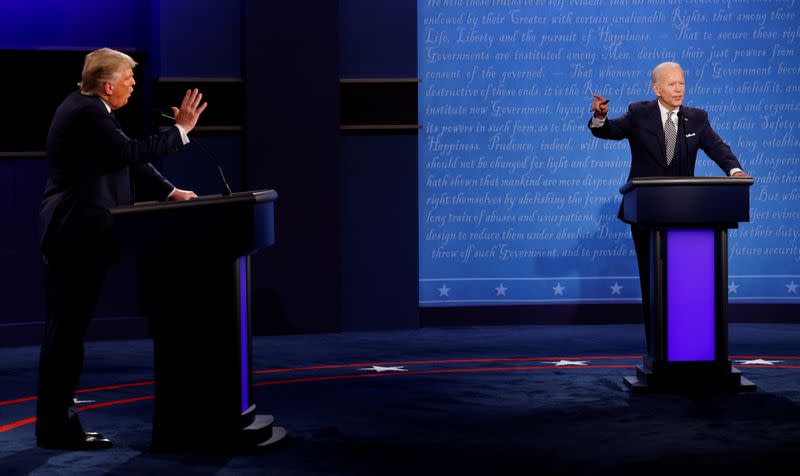 U.S. President Donald Trump and Democratic presidential nominee Joe Biden participate in their first 2020 presidential campaign debate in Cleveland