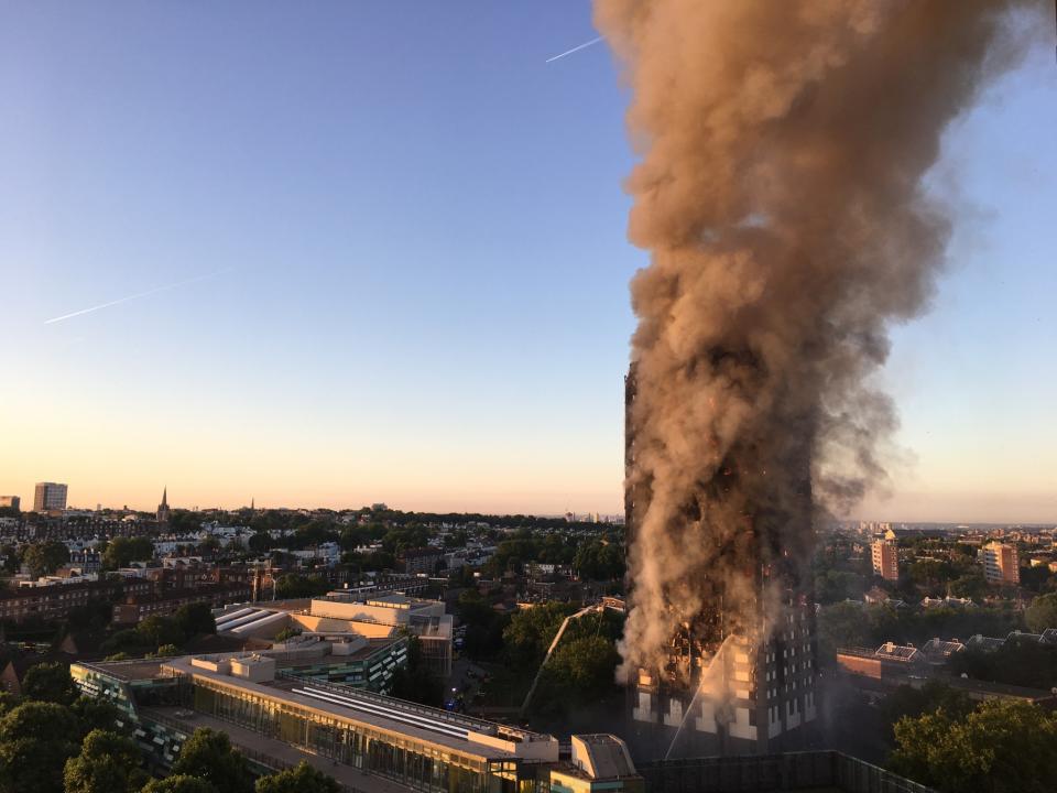 Smoke pours from the Grenfell Tower (PA Images)
