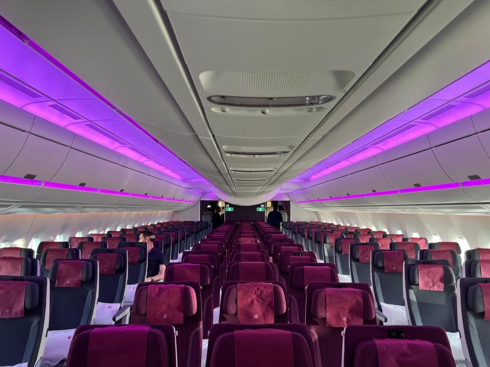 The economy seating on a Qatar Airways A350 viewed from the front center.