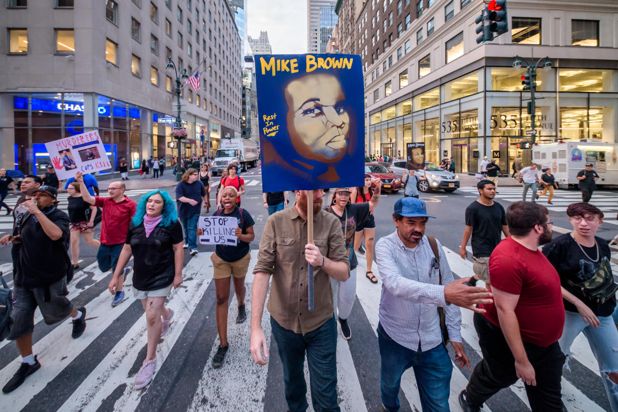 Protesters marching in New York in 2019 to commemorate the 5 year anniversary of Mike Brown's death by Ferguson Police Officer Darren Wilson. (Getty Images)