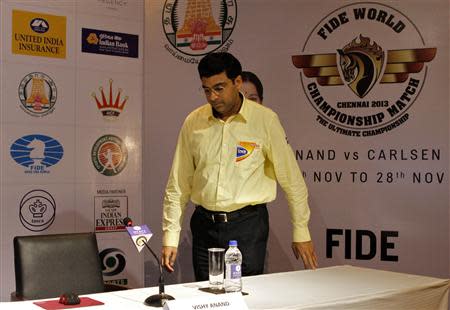 India's Viswanathan Anand arrives to address a news conference after Norway's Magnus Carlsen clinched the FIDE World Chess Championship in the southern Indian city of Chennai November 22, 2013.REUTERS/Babu