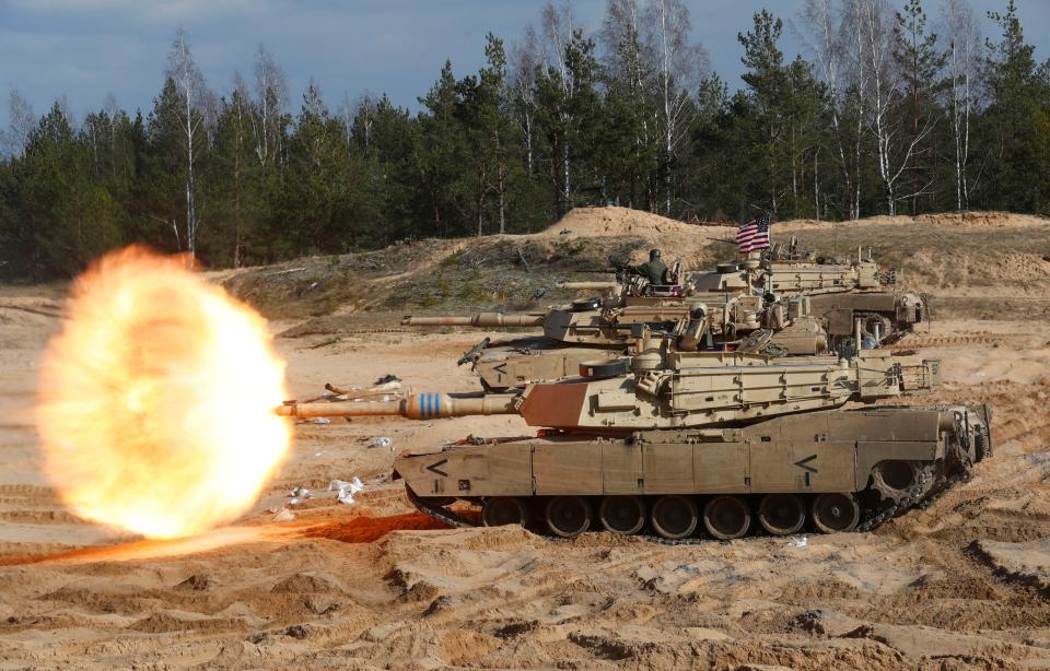 U.S. Army M1A1 Abrams tank fires during NATO enhanced Forward Presence battle group military exercise Crystal Arrow 2021 in Adazi, Latvia March 26, 2021.