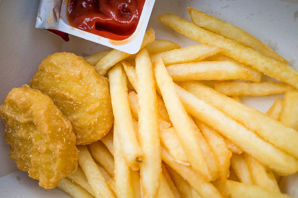 Chicken nuggets and fries with ketchup