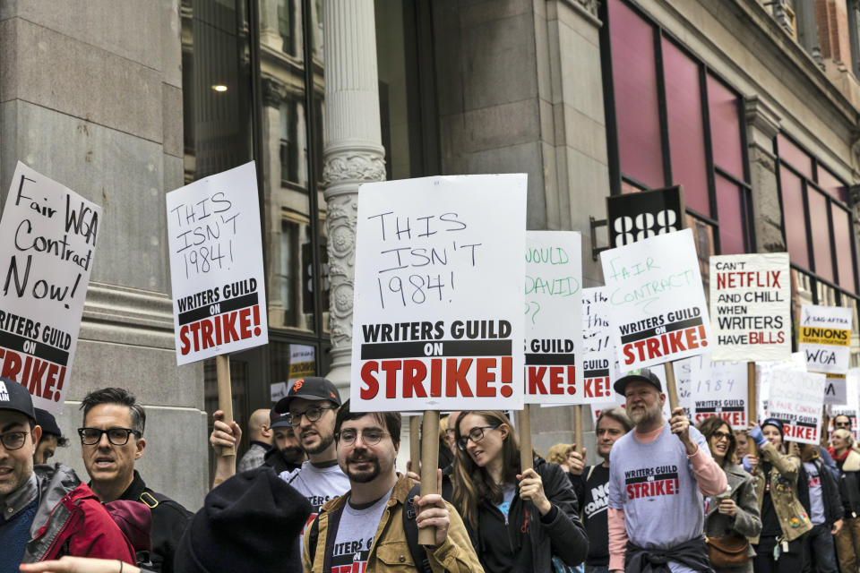 Members of the Writers Guild of America union protest outside the Netflix headquarters near Union Square, Wednesday, May 3, 2023, in New York. (AP Photo/Stefan Jeremiah)