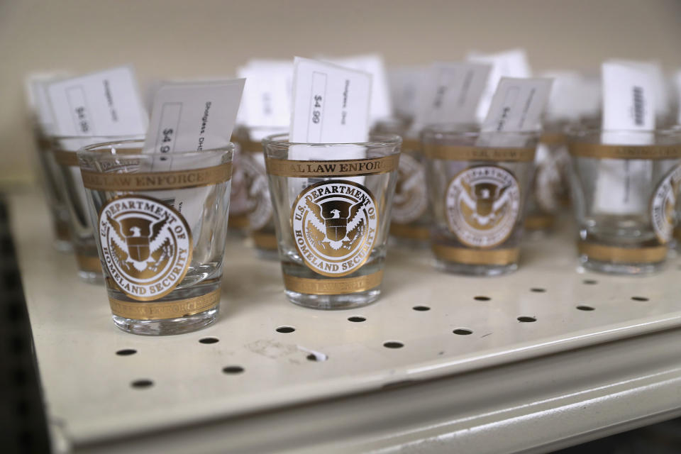 <p>Shot glasses await sale in a souvenir shop at the Federal Law Enforcement Training Center on August 2, 2017 in Artesia, N.M. (Photo: John Moore/Getty Images) </p>