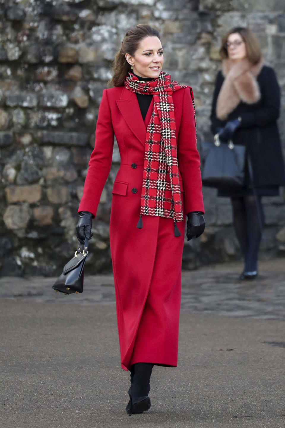 Britain's Kate Duchess of Cambridge at Cardiff Castle on Tuesday Dec. 8, 2020, in Cardiff, Wales. Prince William and Kate Duchess of Cambridge are undertaking a short tour of the UK by train ahead of the Christmas holidays to pay tribute to the inspiring work in local communities. (Chris Jackson/Pool via AP)
