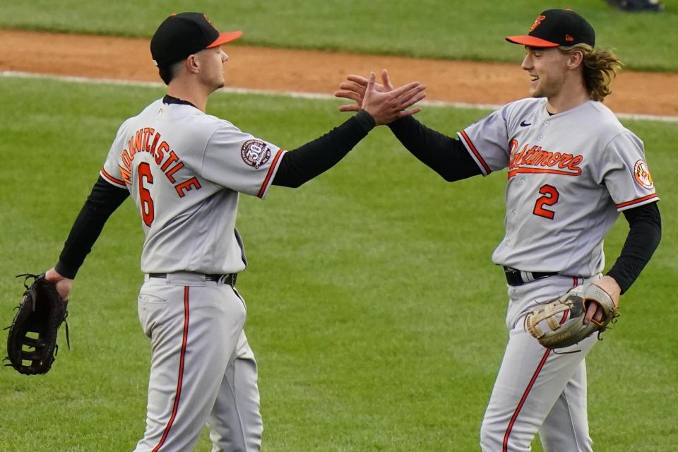 Baltimore Orioles' Ryan Mountcastle (6) celebrates with teammate Gunnar Henderson (2) after a baseball game Sunday, Oct. 2, 2022, in New York. The Orioles won 3-1. (AP Photo/Frank Franklin II)