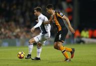 Britain Football Soccer - West Bromwich Albion v Hull City - Premier League - The Hawthorns - 2/1/17 West Bromwich Albion's Hal Robson-Kanu in action with Hull City's Curtis Davies Action Images via Reuters / Matthew Childs Livepic