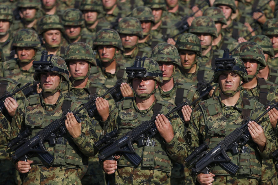 FILE - Serbian Army soldiers perform during a military parade at the military airport Batajnica, near Belgrade, Serbia, on Oct. 19, 2019. Serbia looks set to reintroduce the obligatory military service for its young citizens, the army command said Thursday, Jan. 4, 2024 in a move that comes amid rising tensions in the Balkans. (AP Photo/Darko Vojinovic, File)