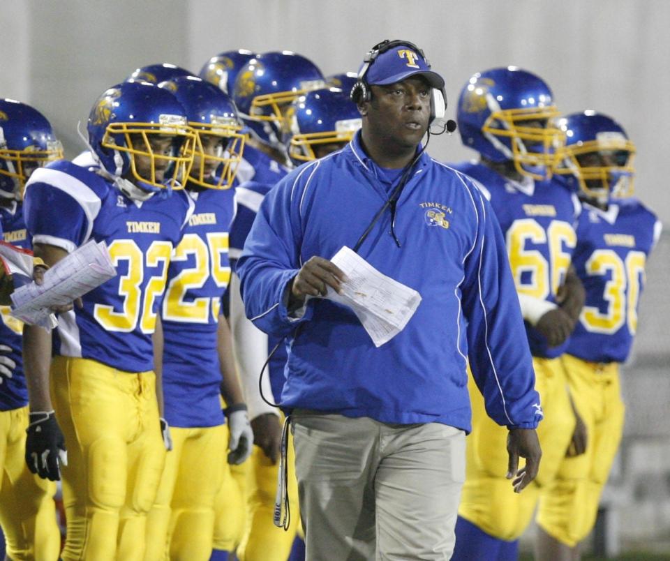 Timken head football coach Kevin Henderson walks the sidelines at Fawcett Stadium, in Canton, in an undated photo.