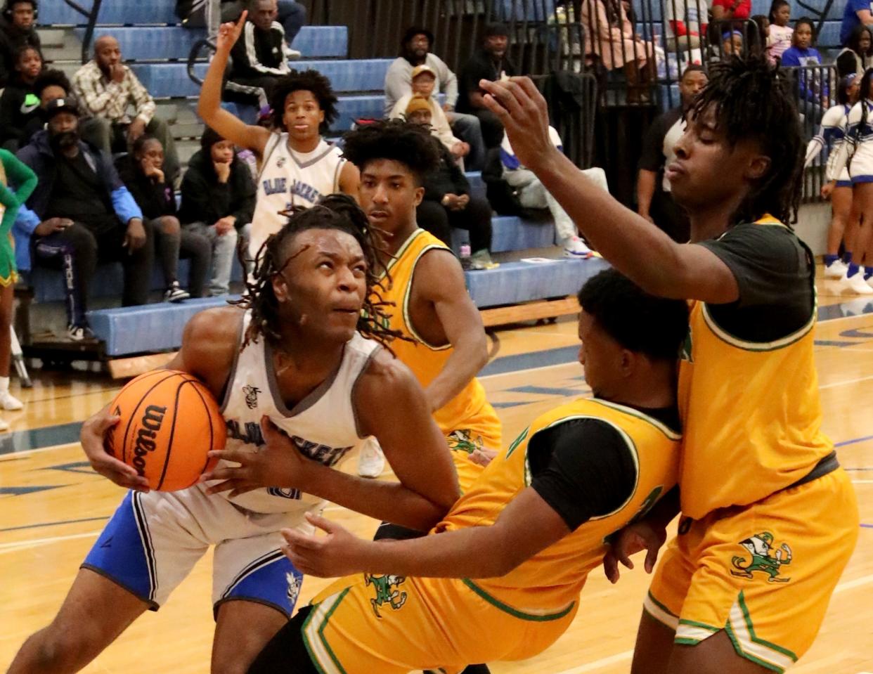 Savannah High's Jermaine Edwards powers to the basket against Dublin during the first round of the State Class A Division 1 tournament at Savannah High.