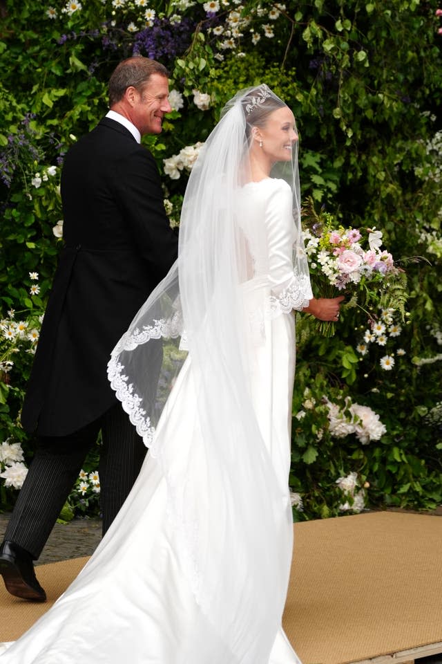 Olivia Henson, with her father Rupert Henson, arrives for her wedding to Hugh Grosvenor, the Duke of Westminster at Chester Cathedral 