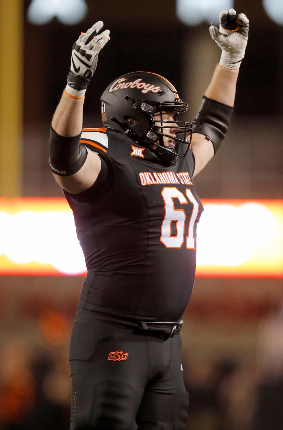 Oklahoma State's Jake Springfield celebrates and OSU score during the first half against Kansas State in Stillwater. Cowboys won 29-21.