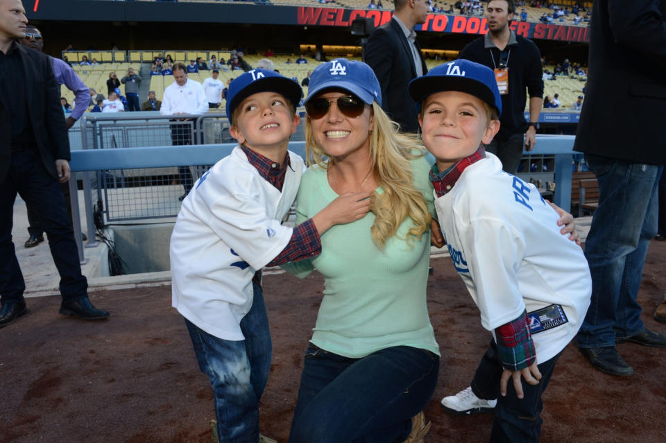 LOS ANGELES, CA - APRIL 17: In this handout photo provided by the LA Dodgers, Britney Spears poses with sons Jayden James Federline (L) and Sean Preston Federline (R) during a game against the San Diego Padres at Dodger Stadium on April 17, 2013 in Los Angeles, California. (Photo by Jon SooHoo/LA Dodgers via Getty Images)