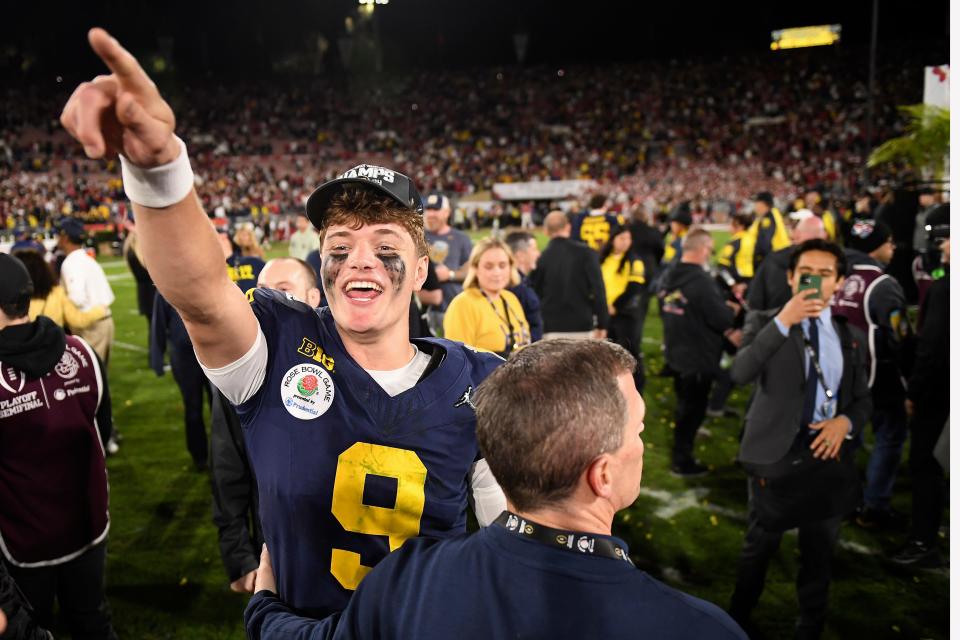 Michigan quarterback J.J. McCarthy (9) celebrates after an overtime win over Alabama at the Rose Bowl CFP NCAA semifinal college football game Monday, Jan. 1, 2024, in Pasadena, Calif. (AP Photo/Kyusung Gong) ORG XMIT: CAPU178