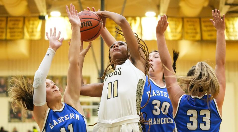 Lapel Bulldogs Laniah Wills (11) attempts to score against Eastern Hancock guard Brooklyn Willis (11) on Tuesday, Dec. 12, 2023, during the game at Lapel High School in Lapel. Eastern Hancock defeated the Lapel Bulldogs, 62-55.