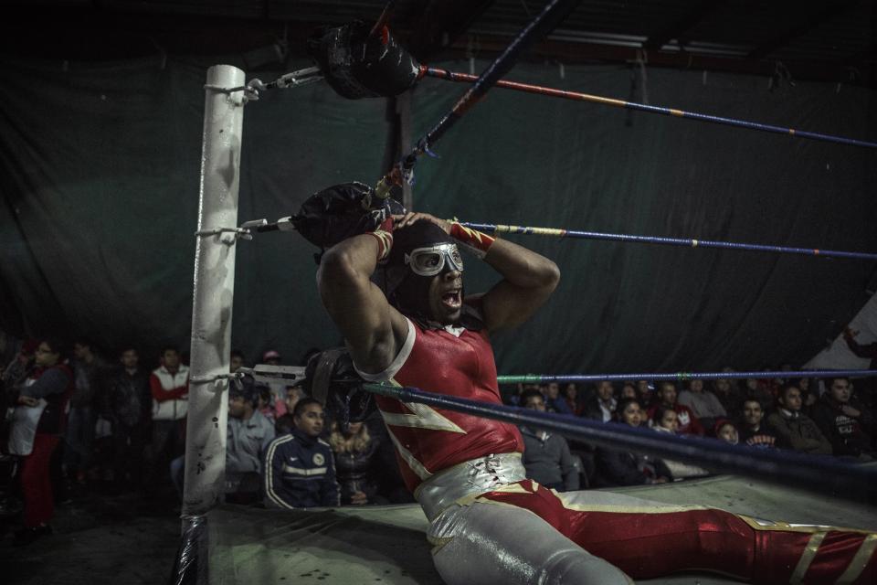 <p>A participant in an underground Hardcore Wrestling Match in Mexico City leans on the ropes. (Annick Donkers/SWPA) </p>