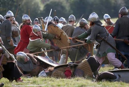 Re-enactors participate in a demonstration before a re-enactment of the Battle of Hastings on the 950th anniversary of the battle, in Battle, Britain October 15, 2016. REUTERS/Neil Hall