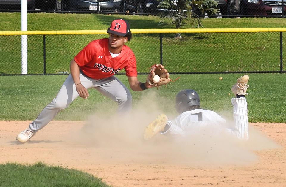 Durfee's Jeyden Espinal gets the ball late as Raiders' Luke Thornton slides in safetly at second.