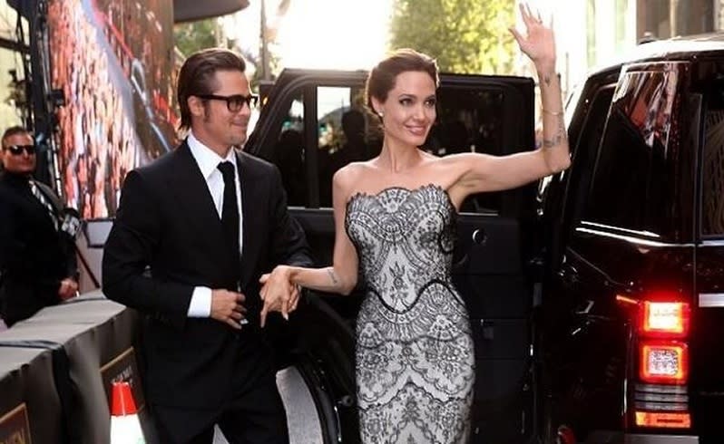 Angelina Jolie and Brad Pitt arrive for the premiere of Unbroken in Sydney. Picture: Universal Pictures/ Twitter