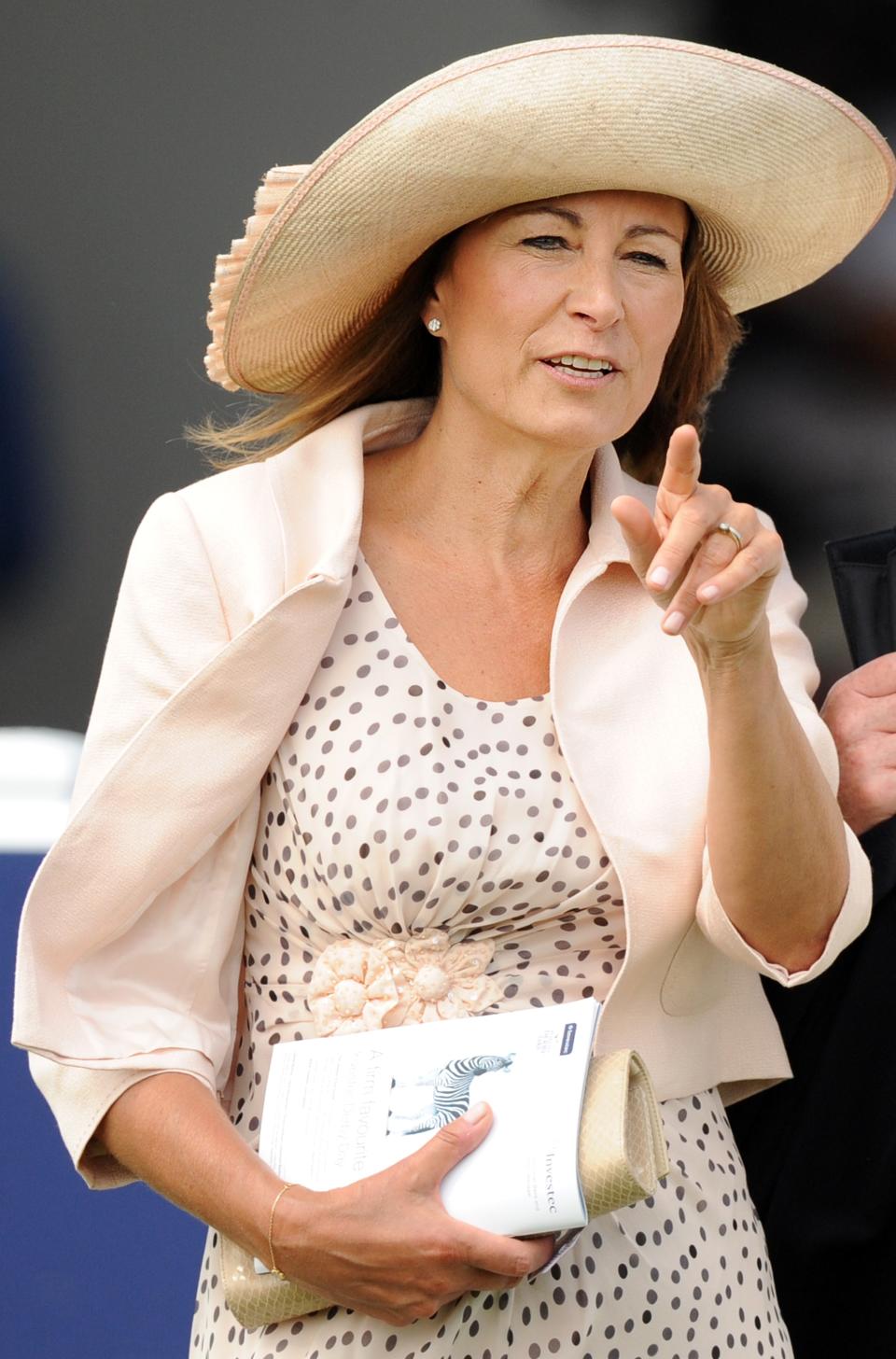 Carole Middleton attends Derby Day, the second day of the Epsom Derby, in Surrey, southern England on June 4, 2011. The Queen's horse, Carlton House, ridden by Ryan Moore, was seeking to be the first Derby winner owned by a reigning monarch since Minoru won in 1909 for King Edward VII. AFP PHOTO/ BEN STANSALL (Photo credit should read BEN STANSALL/AFP/Getty Images)