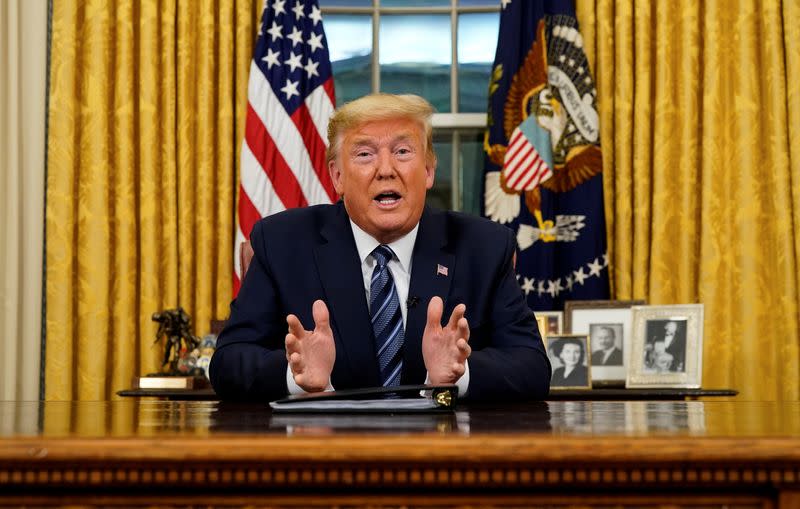 U.S. President Trump speaks about the U.S response to the COVID-19 coronavirus pandemic during an address to the nation from the Oval Office of the White House