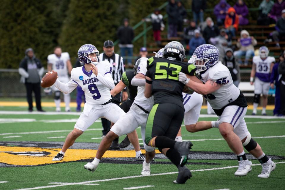 Mount Union senior Braxton Plunk looks to pass at Delaware Valley University on Saturday, Dec. 3, 2022. The Raiders defeated the Aggies 22-6 in NCAA quarterfinal game.