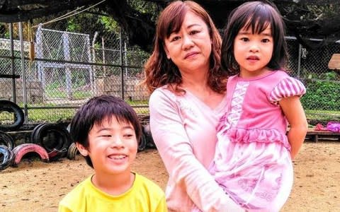 Chiemi Yonashiro and children in Okinawa - Credit: Danielle Demetriou