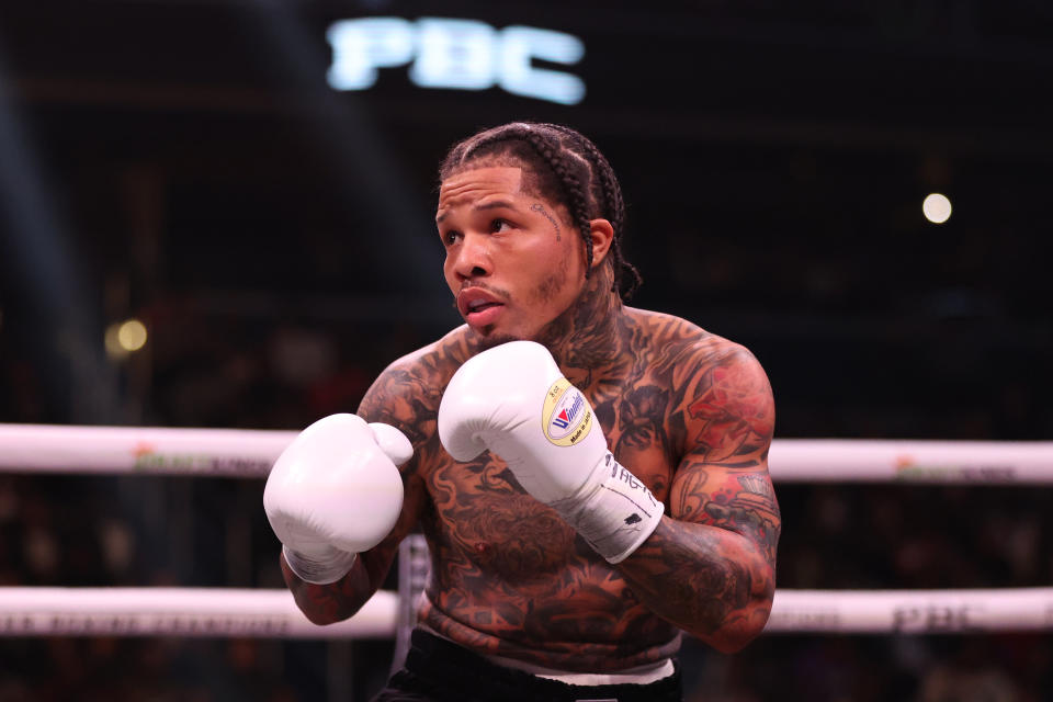 WASHINGTON, DC - JANUARY 07: Gervonta Davis punches Hector Luis Garcia in their WBA World Lightweight Championship bout at Capital One Arena on January 7, 2023 in Washington, DC. (Photo by Patrick Smith/Getty Images)