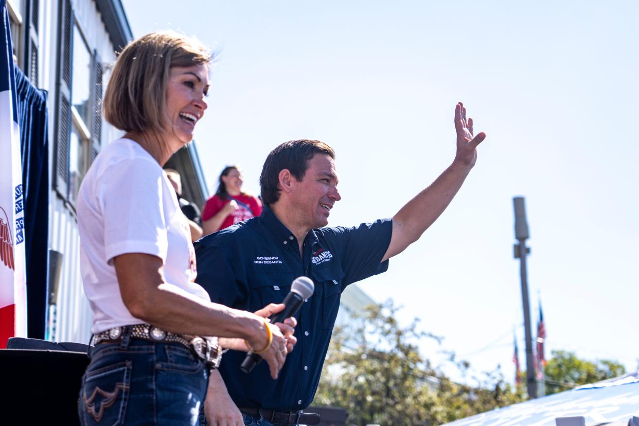 GOP presidential candidate Ron DeSantis waves to the crowd during Gov. Kim Reynolds' Fair-Side Chat during day three of the Iowa State Fair on Saturday, August 12, 2023 in Des Moines.