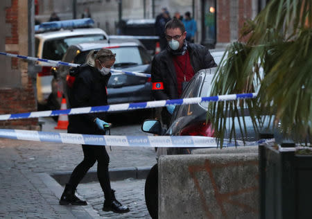 Police work outside the police headquarters after a knife attack on a police officer, according to local media reports, in Brussels, Belgium November 20, 2018. REUTERS/Yves Herman