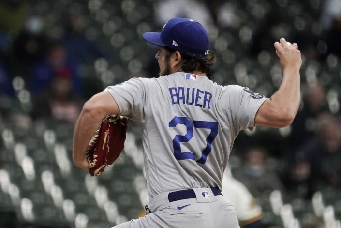 Los Angeles Dodgers starting pitcher Trevor Bauer throws during the first inning of a baseball game against the Milwaukee Brewers Thursday, April 29, 2021, in Milwaukee. (AP Photo/Morry Gash)