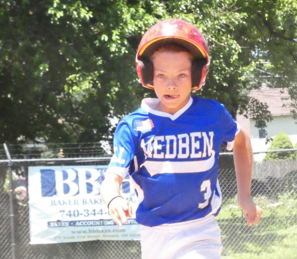 Jace Conners, of North Newark's Med Ben, races to third base against Heath's Texas Roadhouse during the Farm Division semifinals of the Licking County Shrine Tournament at Mound City Little League complex on Sunday, June 19, 2022. Med Ben plays fellow North Newark foe Park National Bank in the championship game at 8 p.m. Tuesday.