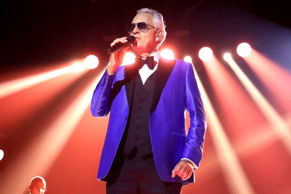 <p>John Parra/Getty</p> Andrea Bocelli performs in Seville, Spain in November 2023