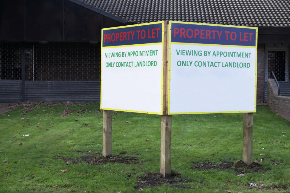 Small billboard reads Property to Let