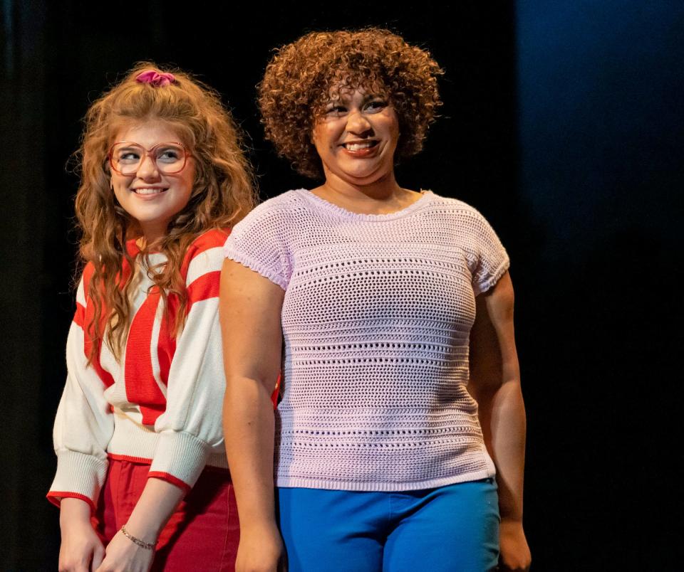 Elise Brown as Wendy Jo and Anjewel Lenoir as Urleen are pictured in a scene from "Footloose" at the Croswell Opera House.