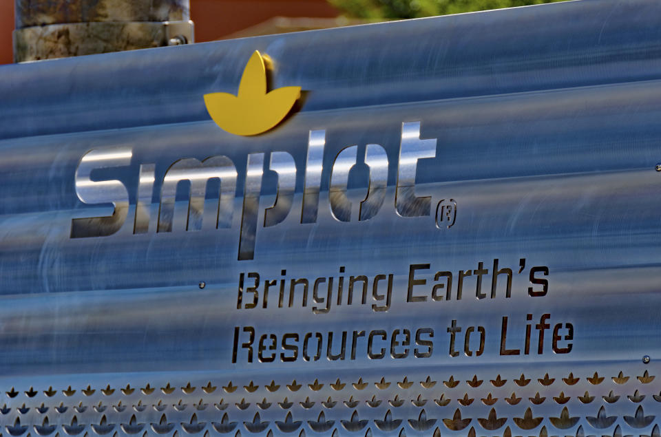 This undated photo provided by the J.R. Simplot Company shows a sign outside the J.R. Simplot Company in Boise. Idaho-based J.R. Simplot Company has acquired gene editing licensing rights that could one day be used to help farmers produce more crops and grocery store offerings such as strawberries, potatoes and avocados stay fresher longer. The company on Monday, Aug. 6, 2018, announced the agreement with DowDuPont Inc. and the Broad Institute of MIT and Harvard, developers of the nascent gene editing technology. (J.R. Simplot Company via AP)