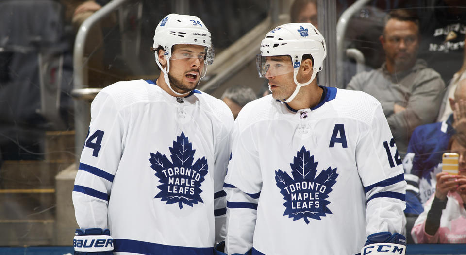 TORONTO, ON - FEBRUARY 4: Auston Matthews #34 and Patrick Marleau #12 of the Toronto Maple Leafs talk in a break against the Anaheim Ducks during the first period at the Scotiabank Arena on February 4, 2019 in Toronto, Ontario, Canada. (Photo by Mark Blinch/NHLI via Getty Images)