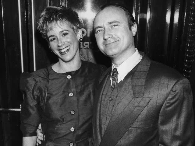 <p>Dave Hogan/Hulton Archive/Getty</p> Phil Collins arrives at the Dominion Theatre in London for the Brit Awards, with Jill Tavelman in 1990