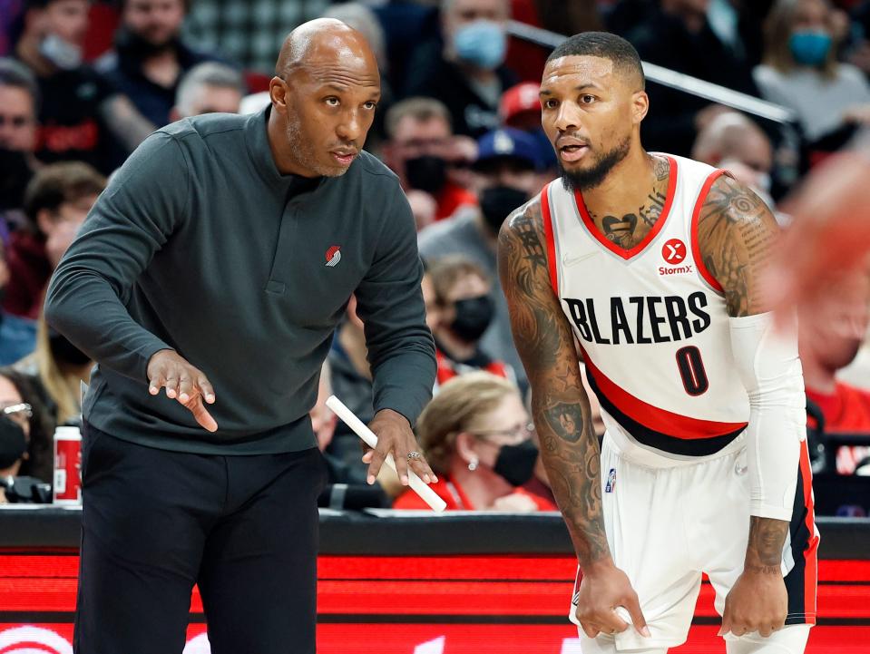 Trail Blazers coach Chauncey Billups talks with Damian Lillard during a recent game.