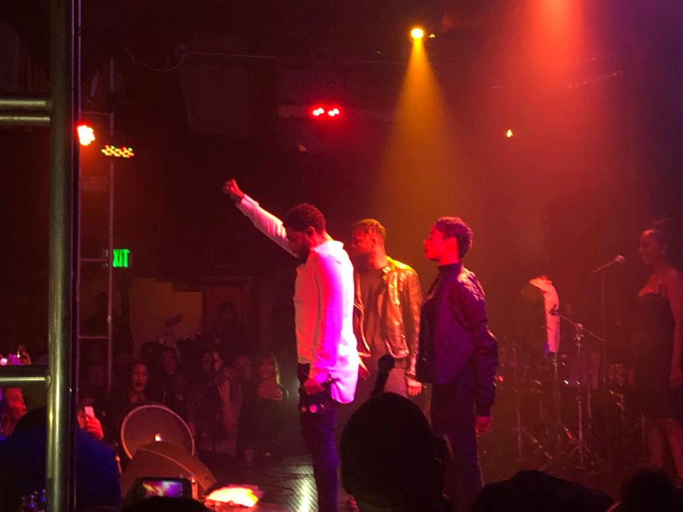 Singer Jussie Smollett gestures onstage during his concert at The Troubadour Saturday in West Hollywood, Calif.