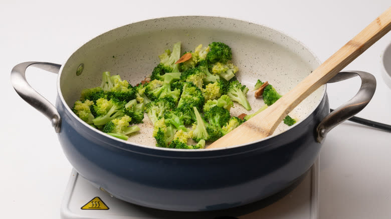 stir-frying garlic and broccoli